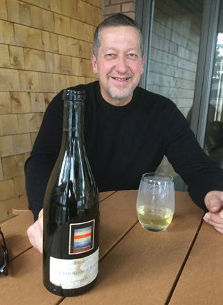 Bob Burkholder enjoying a vintage County Chardonnay